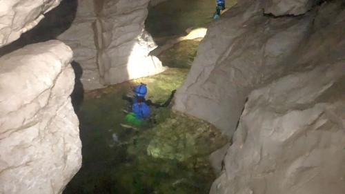 Moments during the canyoning excursion in Donini Cave