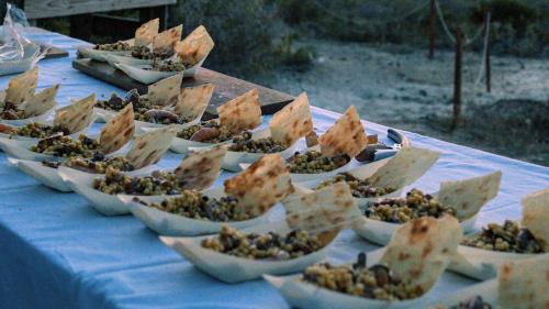 Fregula con frutti di mare servita durante la degustazione di vini a Castelsardo