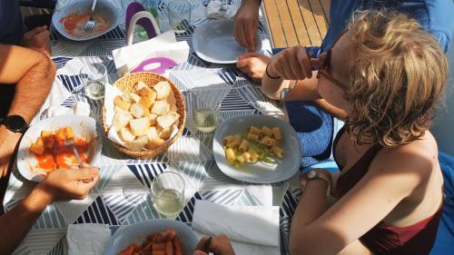 Lunch on board of the catamaran during the daily excursion in the Gulf of Asinara