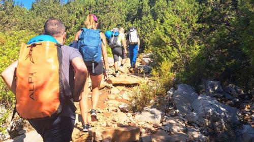 Group of hikers during nature trekking in central east Sardinia