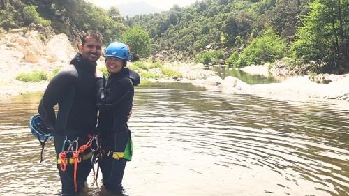 Hikers in the waters of Rio Forru