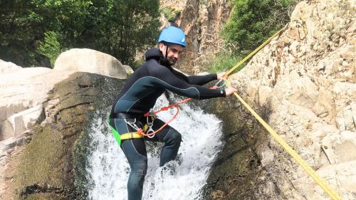 Hiker during guided canyoning tour in Piricanes