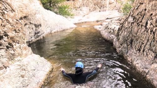 Hiker during guided canyoning tour in Piricanes