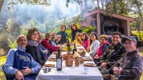 Group of people having an aperitif after the truffle hunt in Laconi