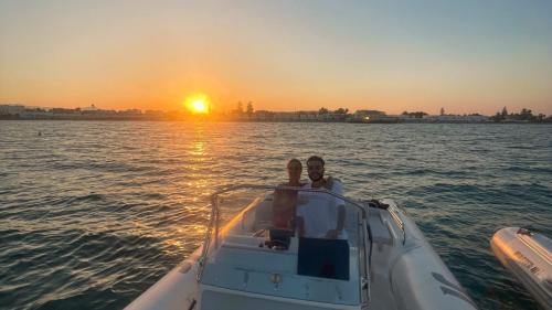 Dinghy sailing in the waters of the Gulf of Cagliari