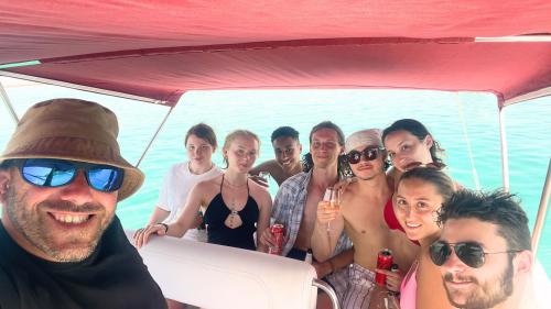 Group photo during the snorkelling tour in the Gulf of Cagliari