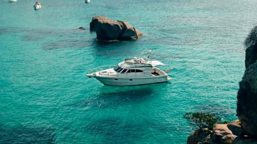 The yacht sailing in the waters of the La Maddalena Archipelago
