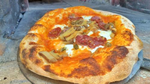 Pizza prepared together with the chef at a villa in Sorso