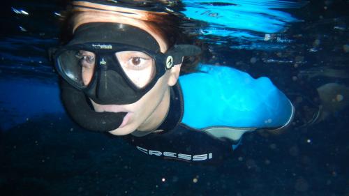 Girl snorkeling in the Gulf of Orosei