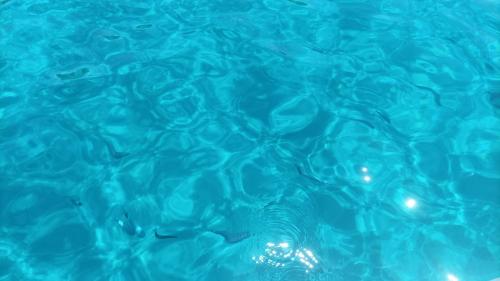 Blue water in the Gulf of Angels in Cagliari