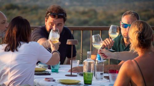 People tasting wines from the winery in Palau