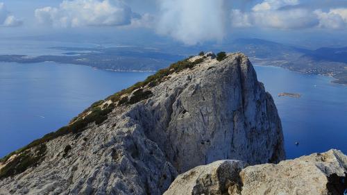 Tavolara limestone rocks with the blue sea of Olbia in the background