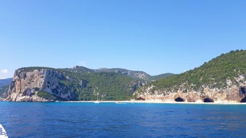 View of the Dorgali coastline with Cala Luna and its caves in the Gulf of Orosei 