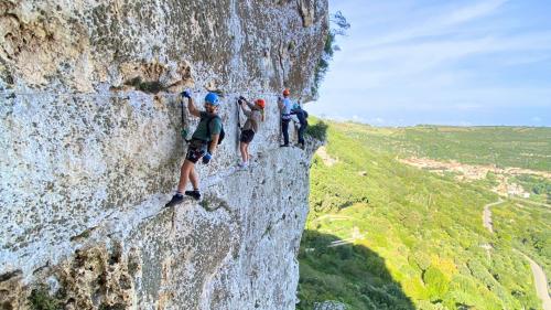 People doing the Giorré Via Ferrata climb in Cargeghe in north-western Sardinia