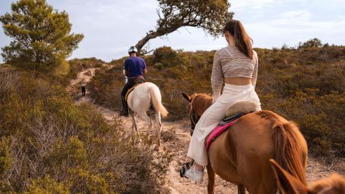 Un momento durante l'escursione a cavallo a Castelsardo